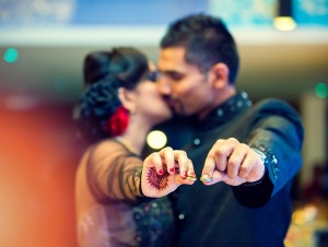 Neeta-Shankar-Photography-Engagement-Shoot-Rings-Couple-kiss-Hotel-Movenpick-Bangalore